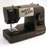 Toyota Super Jeans 15PE, швейная машина с горизонтальным челноком и полуавтоматической петлей, 15 строчек с фиксированной длиной стежка, приставной столик в комплекте